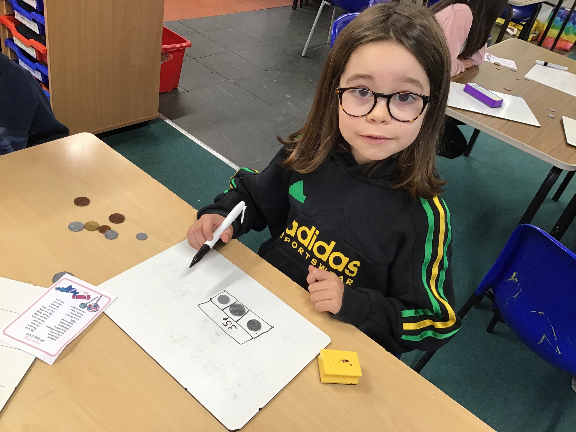 Child learning about coins photo