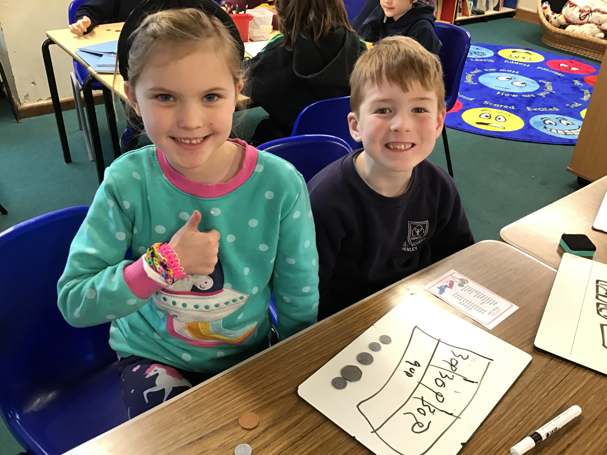 Children learning about coins photo