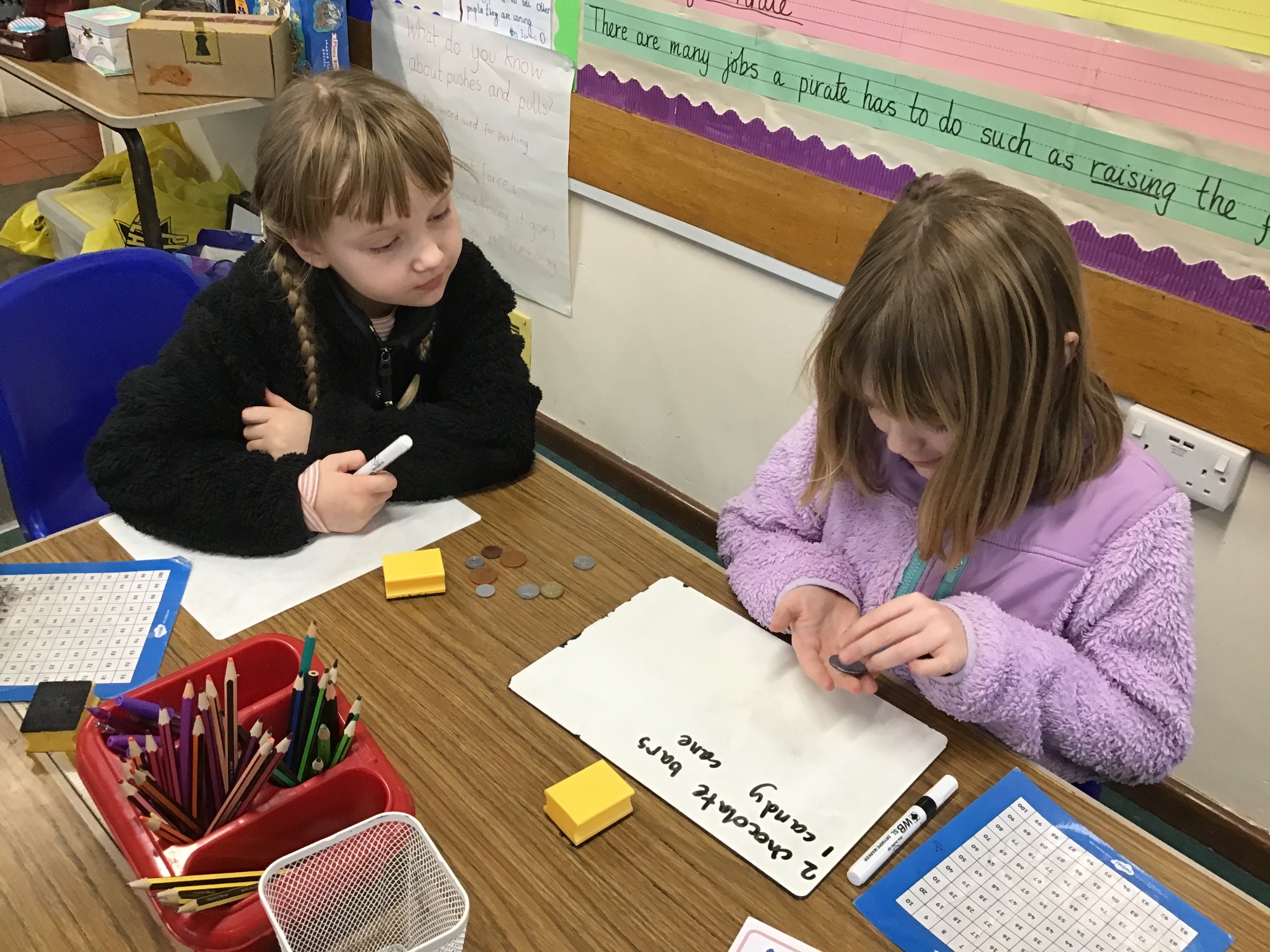 Children learning about coins photo