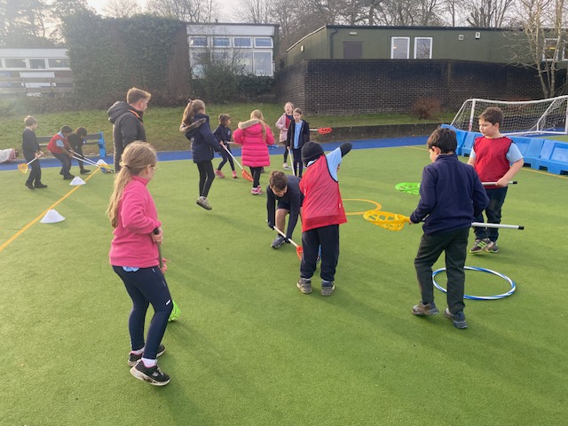 Children playing lacrosse photo